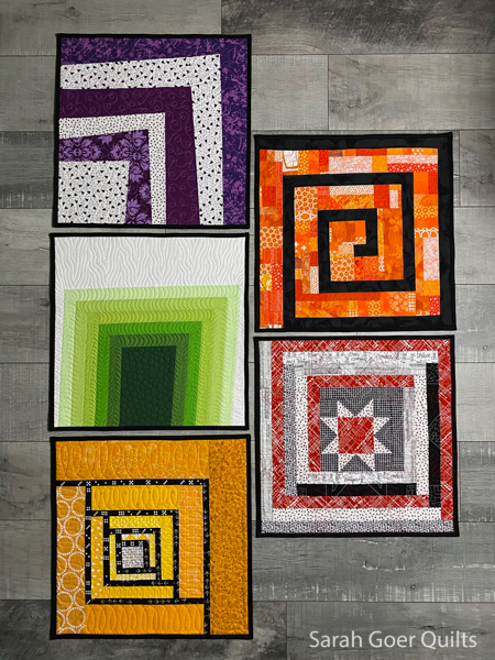 https://sarahgoerquilts.com/wp-content/uploads/2020/12/Improv-Log-Cabin-Mini-Quilts-100-Day-Project.jpg