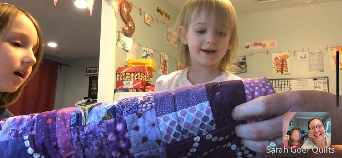 https://sarahgoerquilts.com/wp-content/uploads/2020/12/Purple-Scrappy-Slab-quilt-Facetime2.jpg